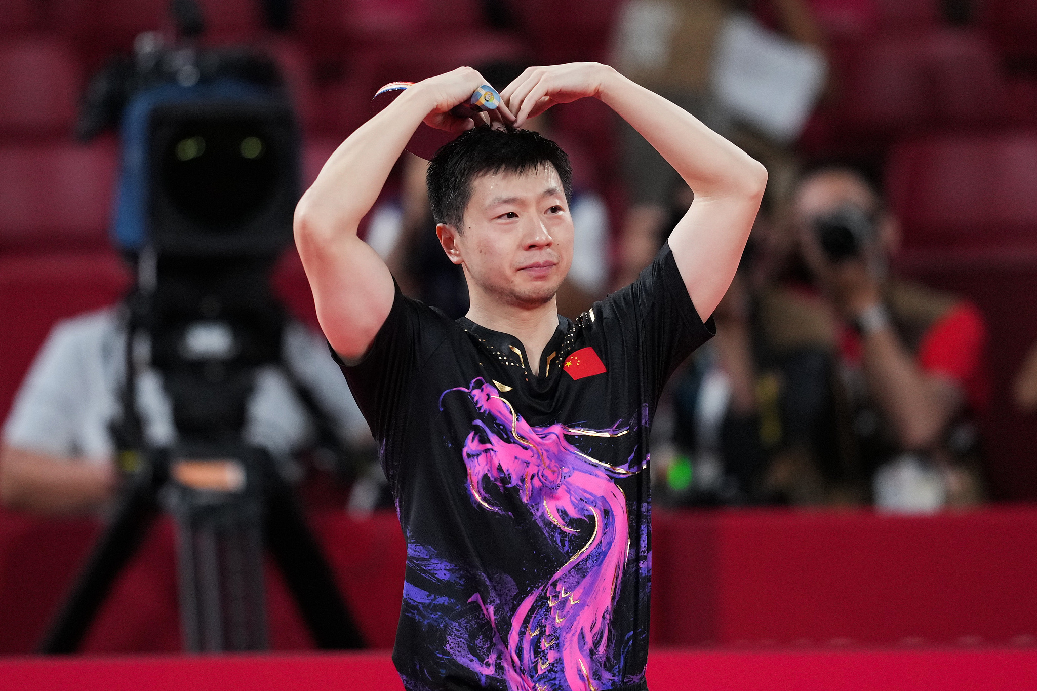 Ma Long defeatS compatriot Fan Zhendong (not pictured) to win the table tennis men's singles title during the Tokyo 2020 Olympic Games in Tokyo, Japan, July 30, 2021. /CFP