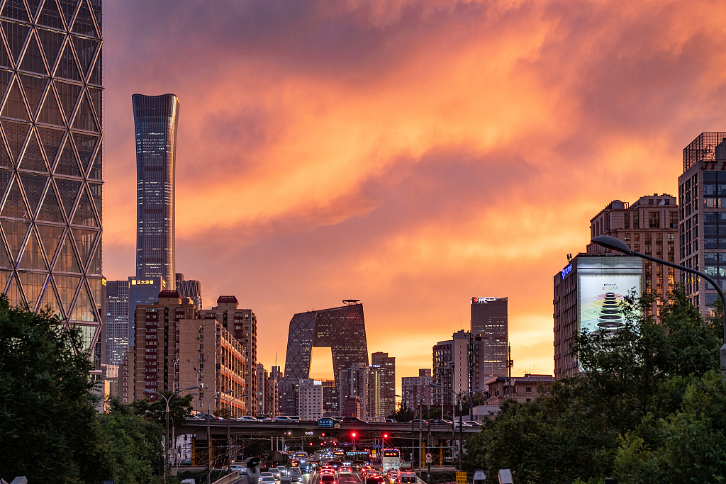 A view of the sunset above the skyline of Beijing's central business district on May 14, 2024. /CFP