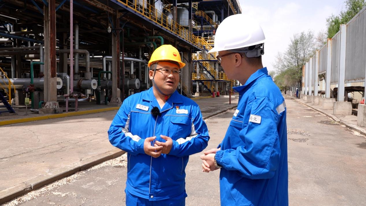 Lu Chuantao, the deputy manager of Refinery No. 3 in CNPC Fushun Petrochemical Company talks to CGTN reporter, Fushun City, northeastern China's Liaoning Province. /CGTN