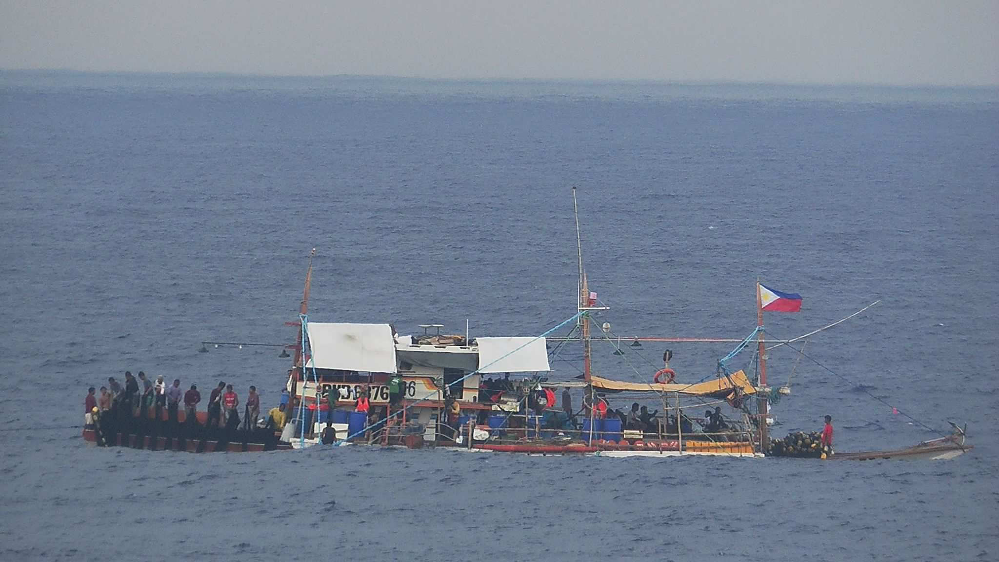 Philippine vessels are illegally gathered in the waters adjacent to Huangyan Island, May 16, 2024. /China Media Group