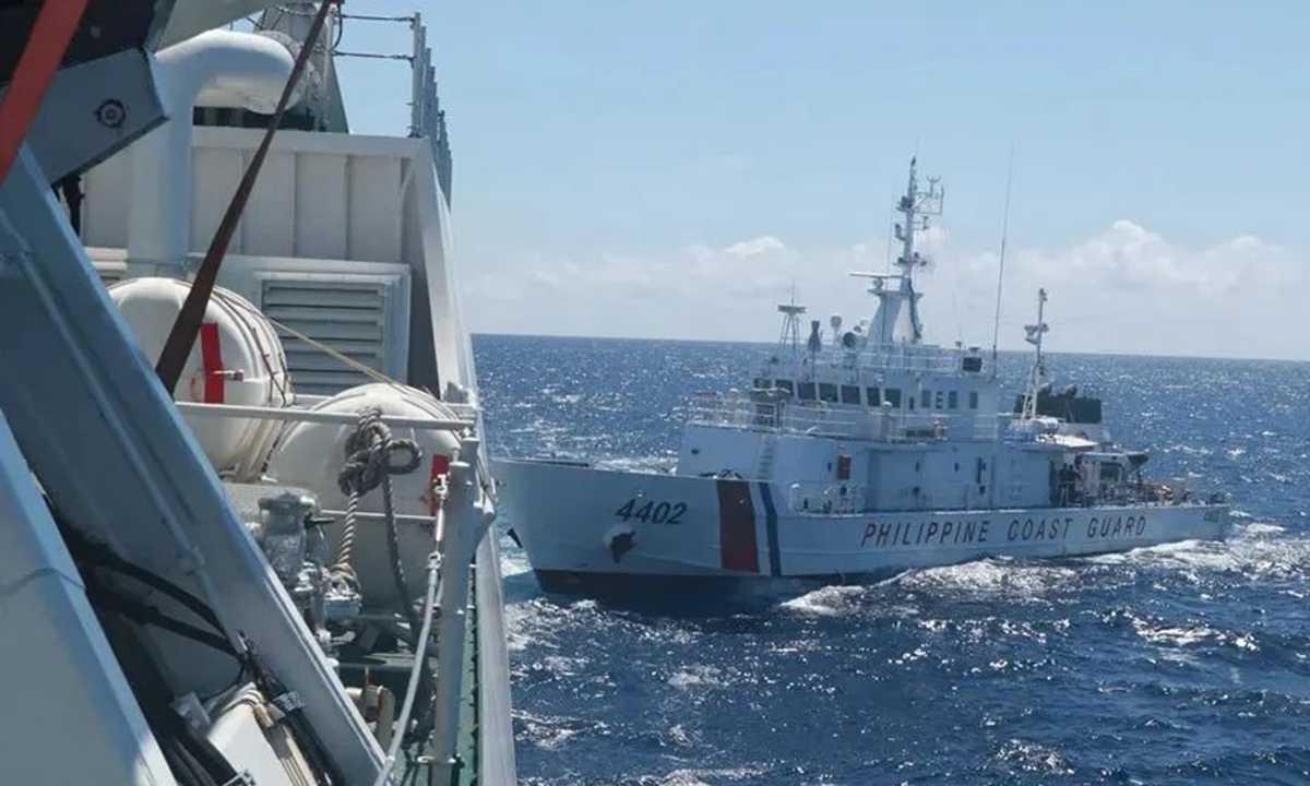 China Coast Guard drives away Philippine vessels intruding into waters of China's Nansha Islands on August 5, 2023. /China Coast Guard