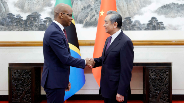 Chinese Foreign Minister Wang Yi, also a member of the Political Bureau of the Communist Party of China Central Committee, meets with January Yusuf Makamba, Tanzania's Minister for Foreign Affairs and East African Cooperation, in Beijing on Friday. /China Foreign Ministry 
