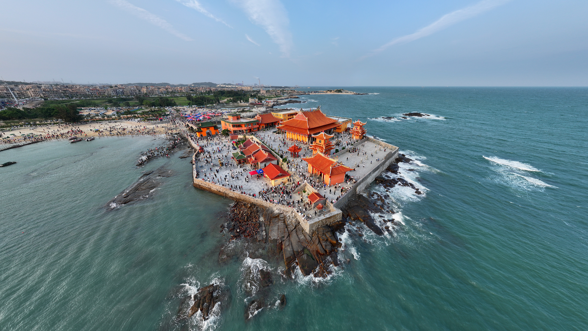 An aerial photo taken on May 3, 2024, shows the Luojia Temple, a distinctive coastal sanctuary for Buddhists, nestled along the coast of Shishi City, southeast China's Fujian Province. /CFP