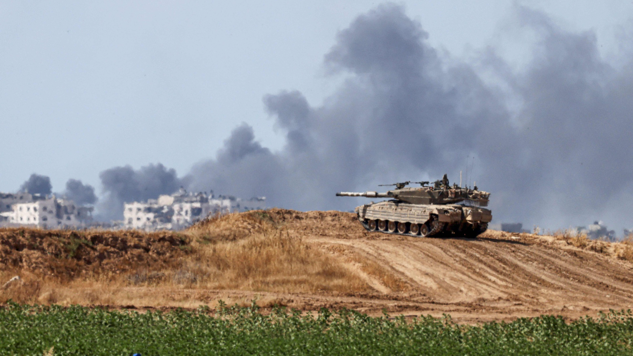 An Israeli army battle tank takes a position in southern Israel near the border with the Gaza Strip, May 13, 2024. /CFP