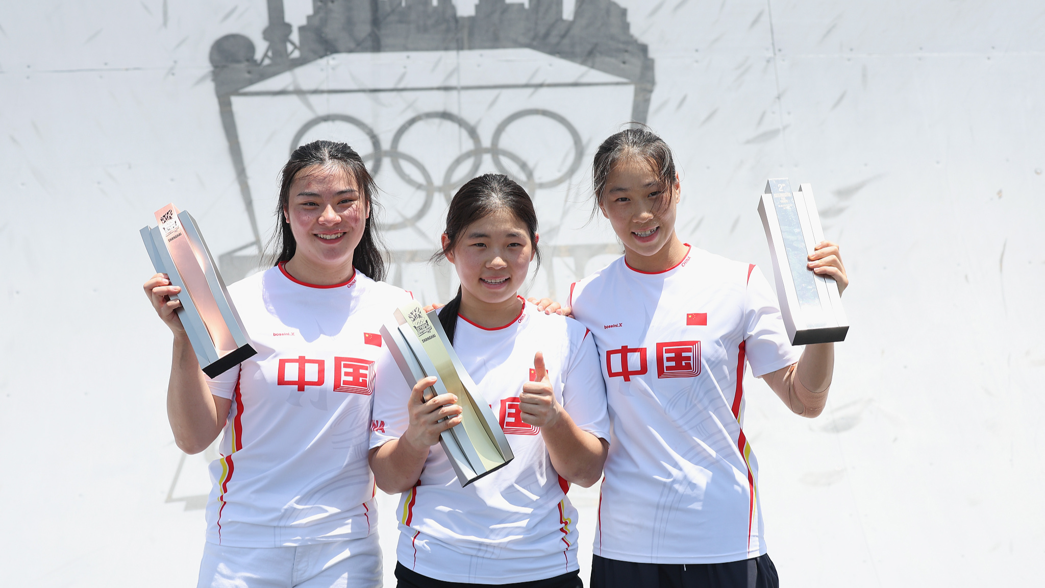 L-R: Sun Jiaqi, Sun Sibei and Deng Yawen pose for at the medal ceremony for the Women's Park Cycling BMX Freestyle Final on day three of the Olympic Qualifier Series Shanghai in Shanghai, China,May 18, 2024. /CFP
