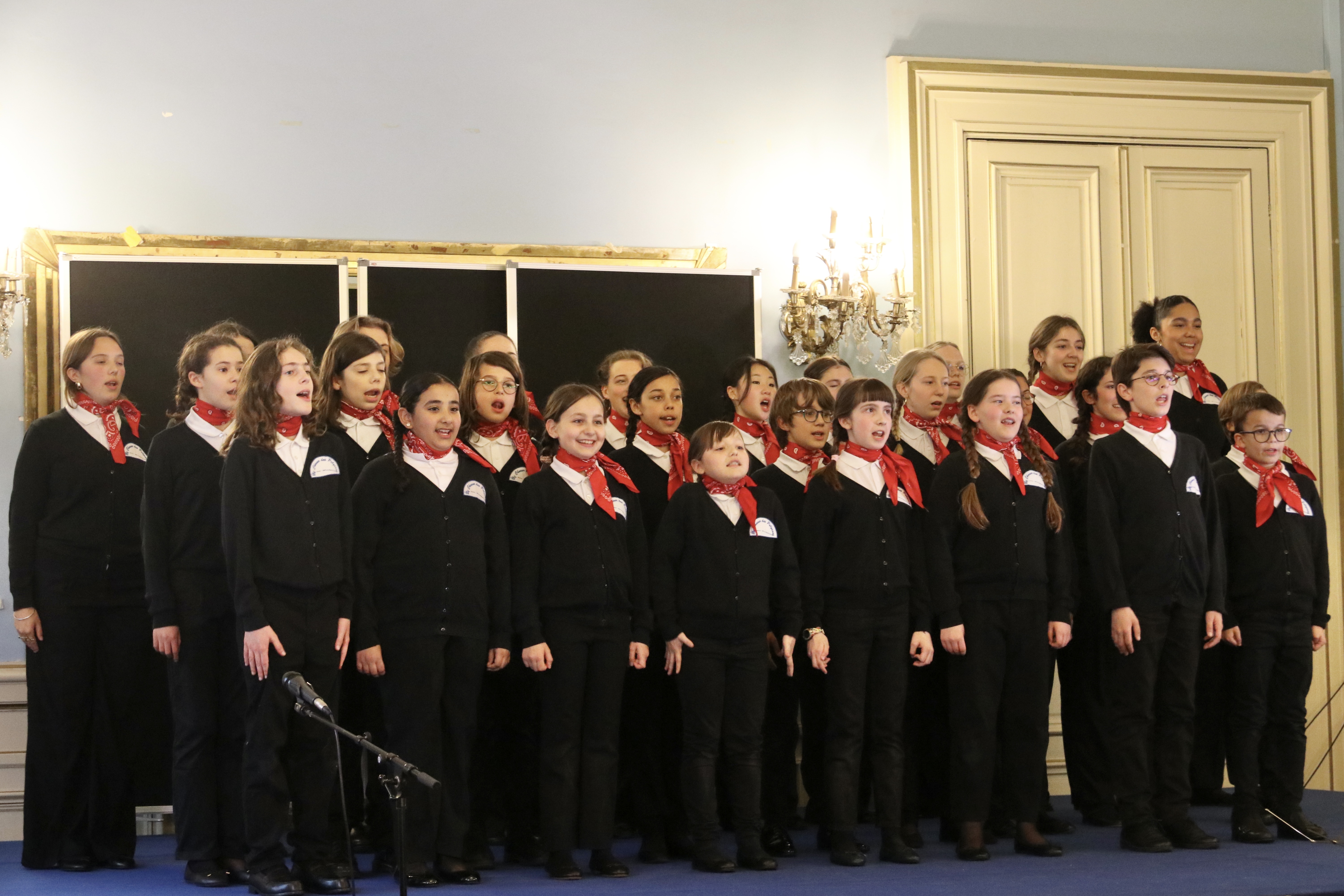 Members of the Polysons Children's Choir perform during a concert in Paris, France. /Photo provided to CGTN