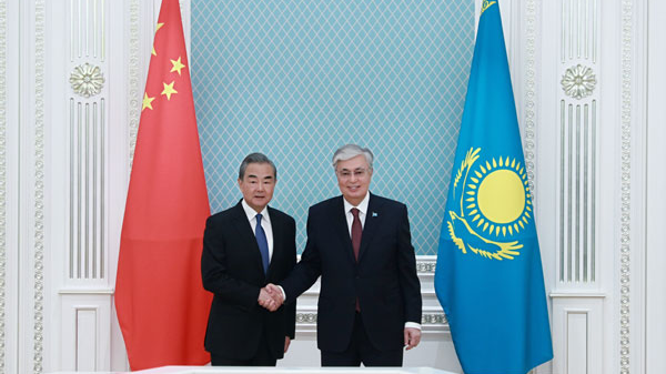 Kazakh President Kassym-Jomart Tokayev (R) meets with Chinese Foreign Minister Wang Yi, also a member of the Political Bureau of the Communist Party of China Central Committee, in Astana, the capital of Kazakhstan, May 20, 2024. /Chinese Ministry of Foreign Affairs