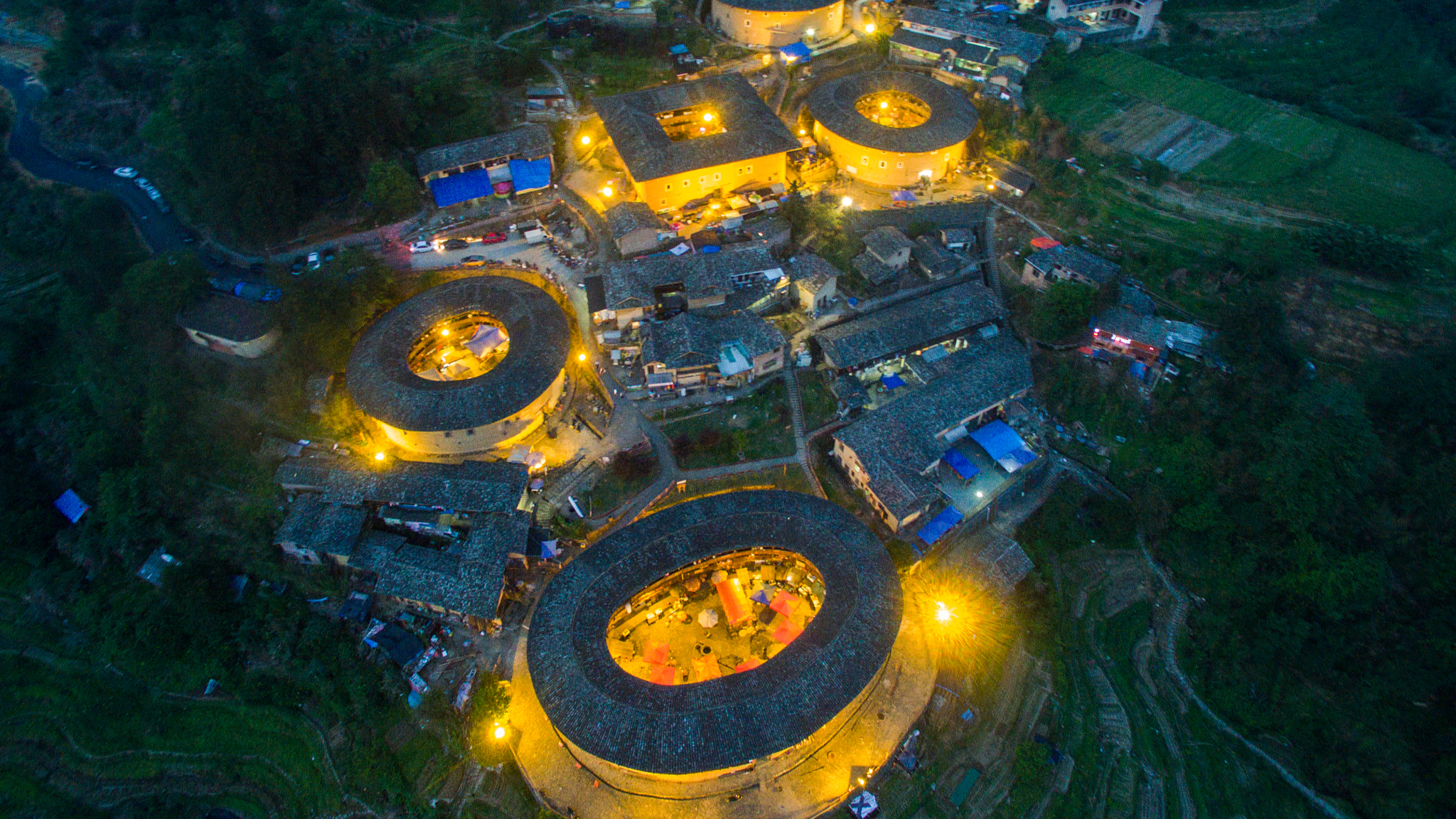An aerial view of the Chuxi Tulou Cluster that sits among terraced fields in Chuxi Village, Yongding County, Fujian's Longyan City, on May 3, 2016. /CFP
