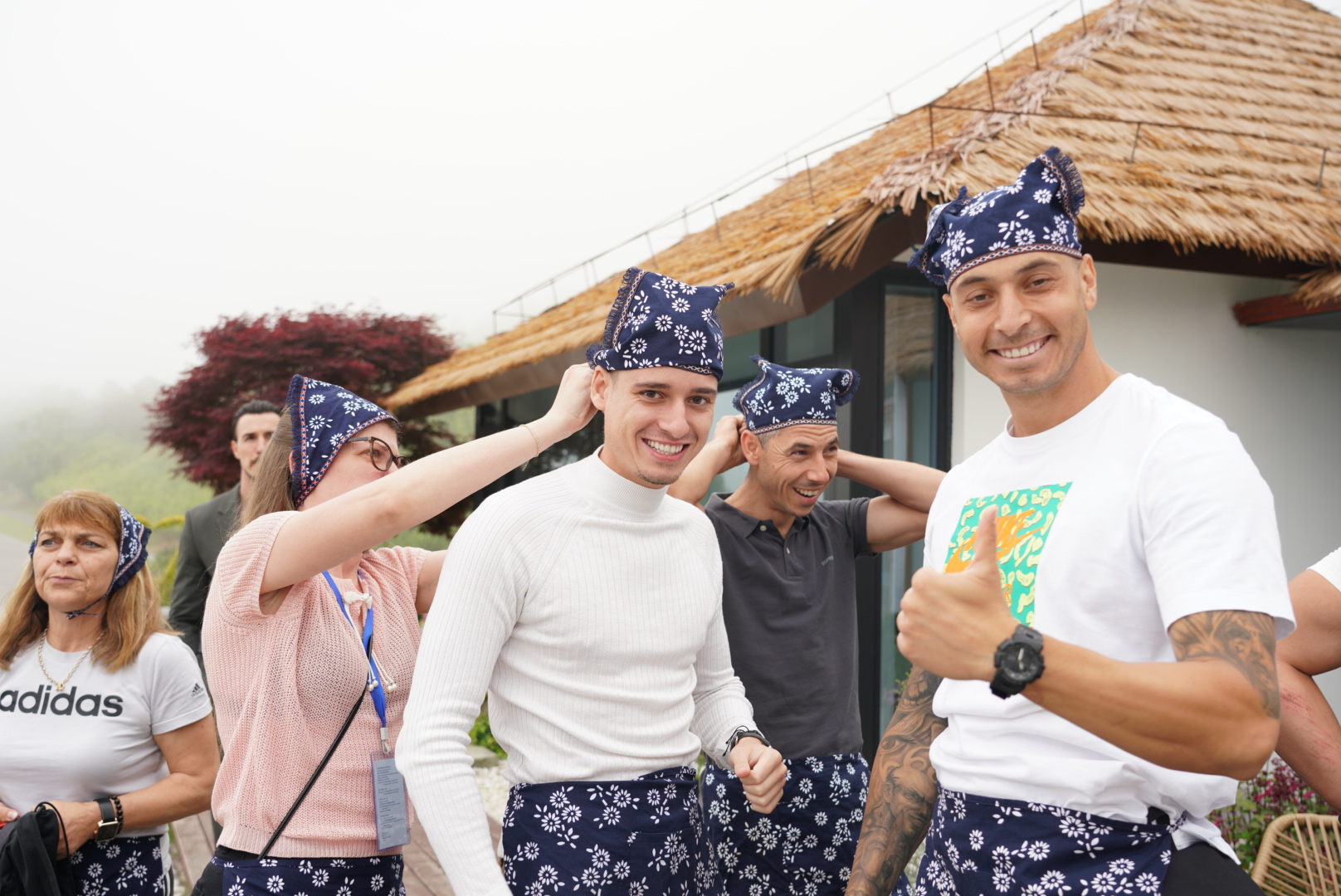 A group of Bulgarian visitors take part in a tea-picking and tasting activity at a tea garden near Dongqian Lake in Ningbo City, Zhejiang Province on May 20, 2024. /Photo provided to CGTN