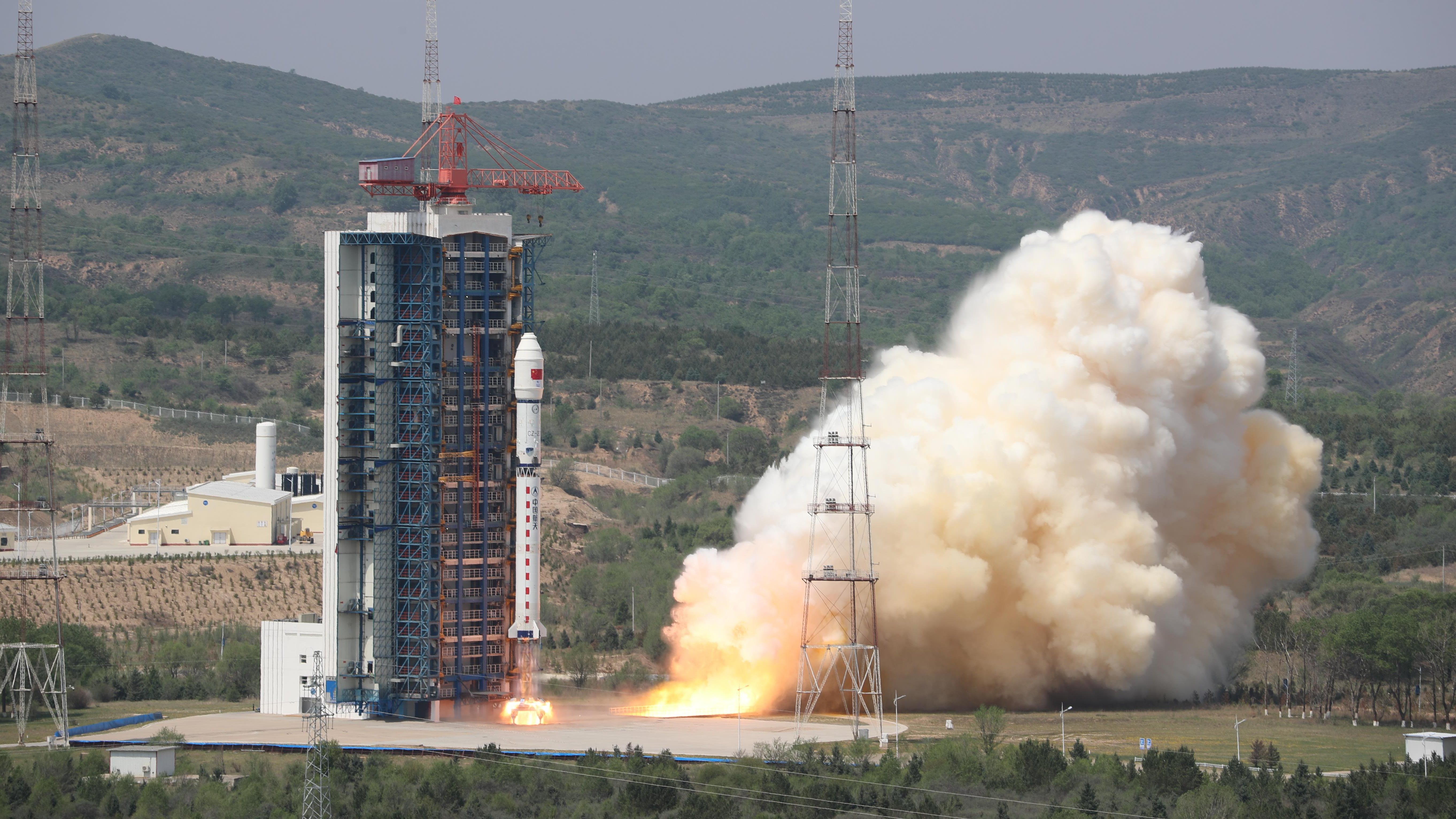 A Long March-2D rocket carrying four satellites blasts off from the Taiyuan Satellite Launch Center in north China's Shanxi Province, May 20, 2024. /CMG