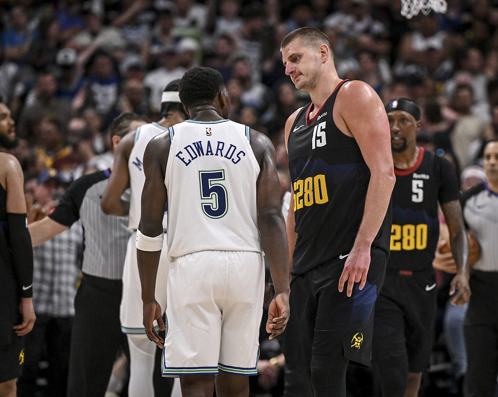 Nikola Jokic (#15) of the Denver Nuggets and Anthony Edwards (#5) of the Minnesota Timberwolves exchange words during their NBA Playoffs at Ball Arena in Denver, U.S., May 19, 2024. /CFP