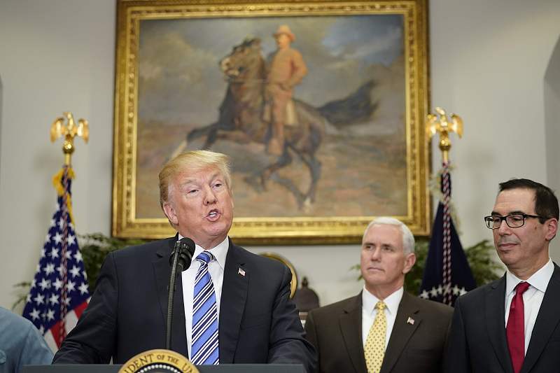 U.S. President Donald Trump speaks before signing Section 232 Proclamations on Steel and Aluminum Imports in the Oval Office of the White House in Washington, D.C., United States, March 8, 2018. /CFP