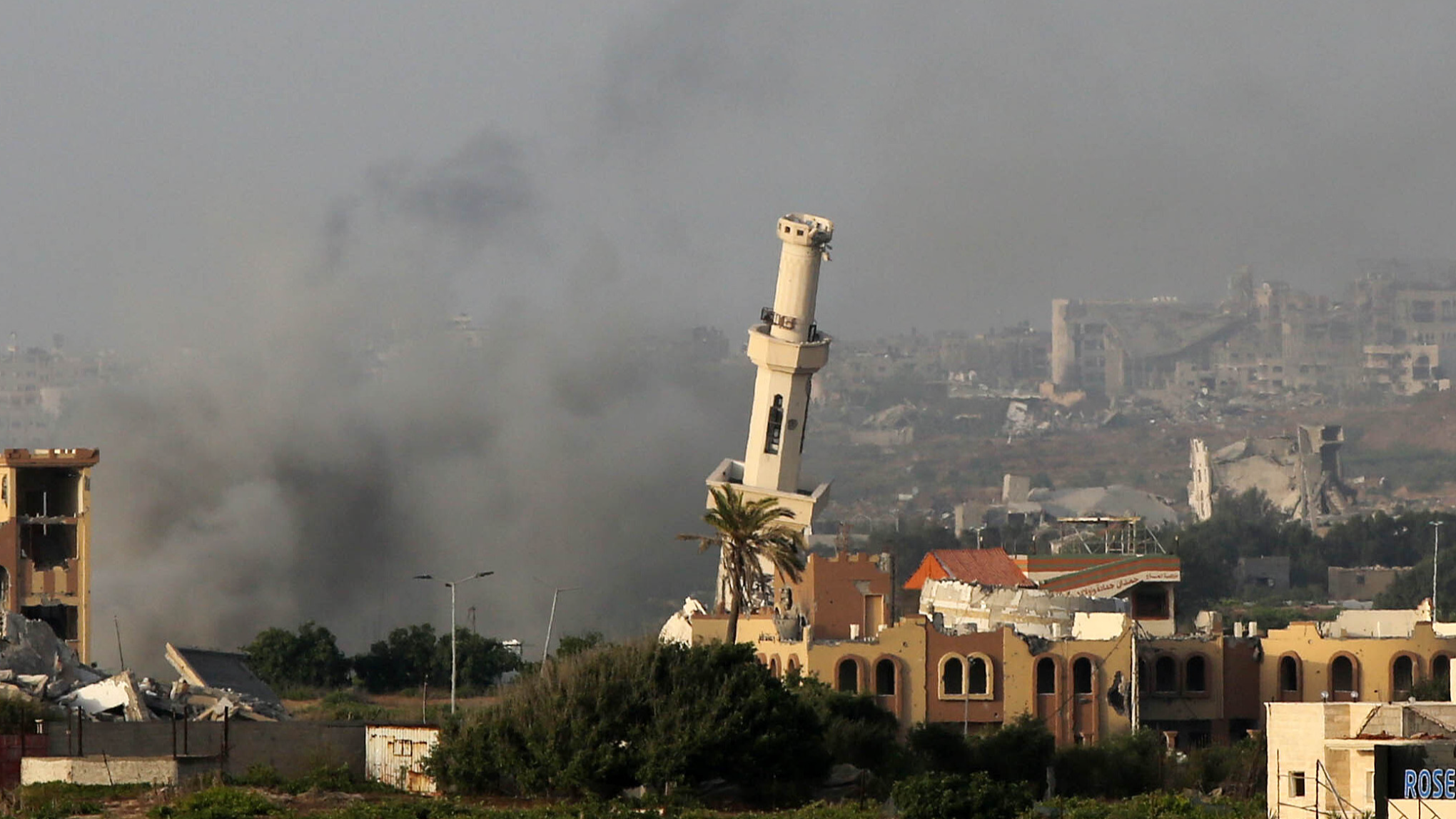 A view of damage as smoke rises after Israeli attacks on the northern Gaza Strip, May 21, 2024. /CFP