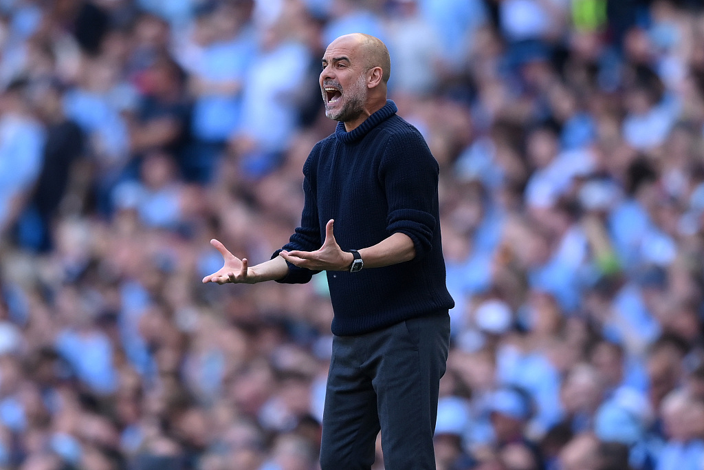 Pep Guardiola, manager of Manchester City, gestures during the Premier League game against West Ham United at the Etihad Stadium in Manchester, England, May 19, 2024. /CFP