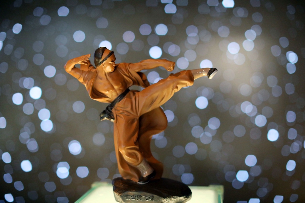 A Shiwan ceramic figurine from Foshan, Guangdong Province of kung fu master Wong Fei-hung, or Huang Feihong, is displayed on May 18, 2024. /IC