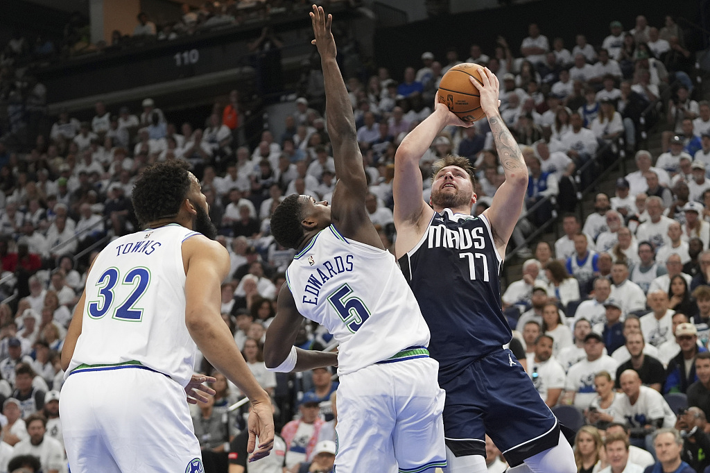 Luka Doncic (#77) of the Dallas Mavericks shoots in Game 1 of the NBA Western Conference Finals against the Minnesota Timberwolves at the Target Center in Minneapolis, Minnesota, May 22, 2024. /CFP