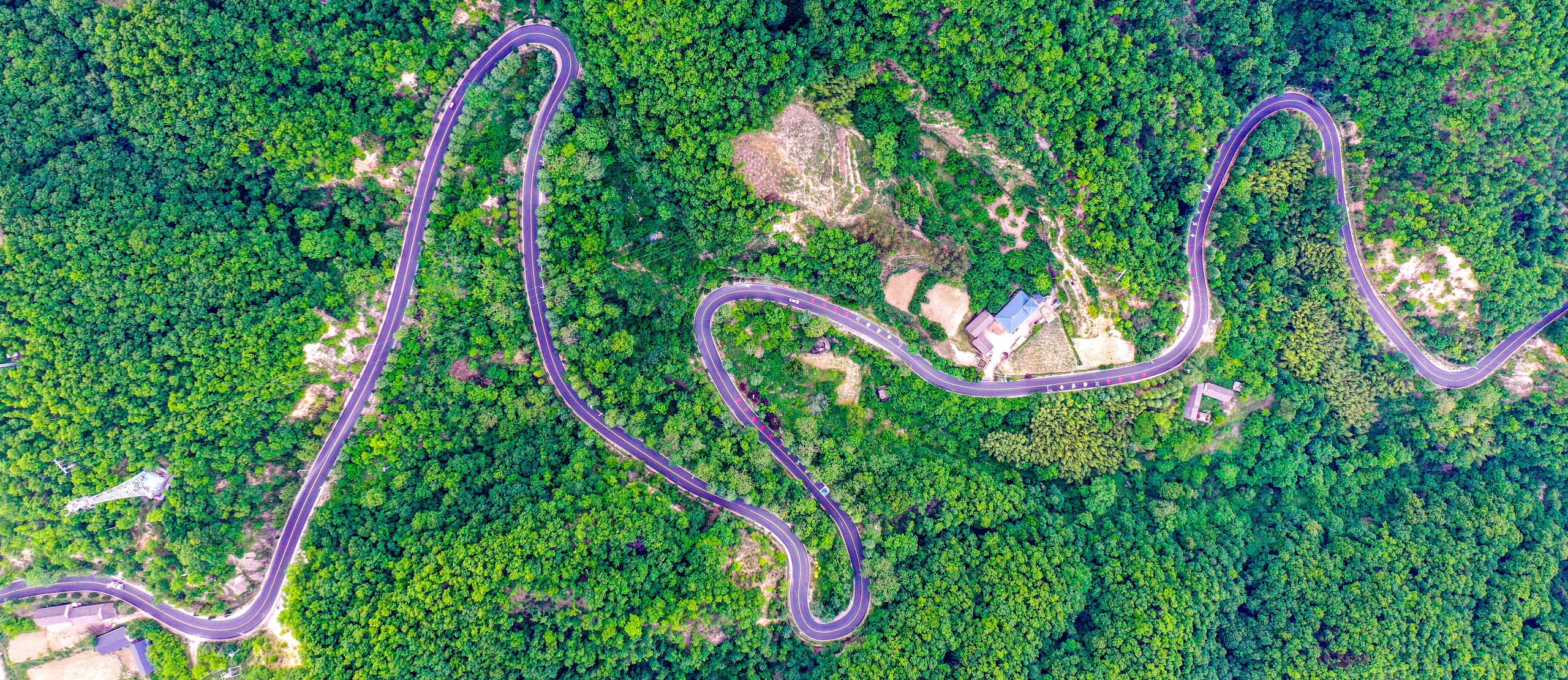 An aerial view of the Eco-Funiu No.1 Tourism Highway is taken on May 22, 2024 in Luoyang, Henan Province. /IC