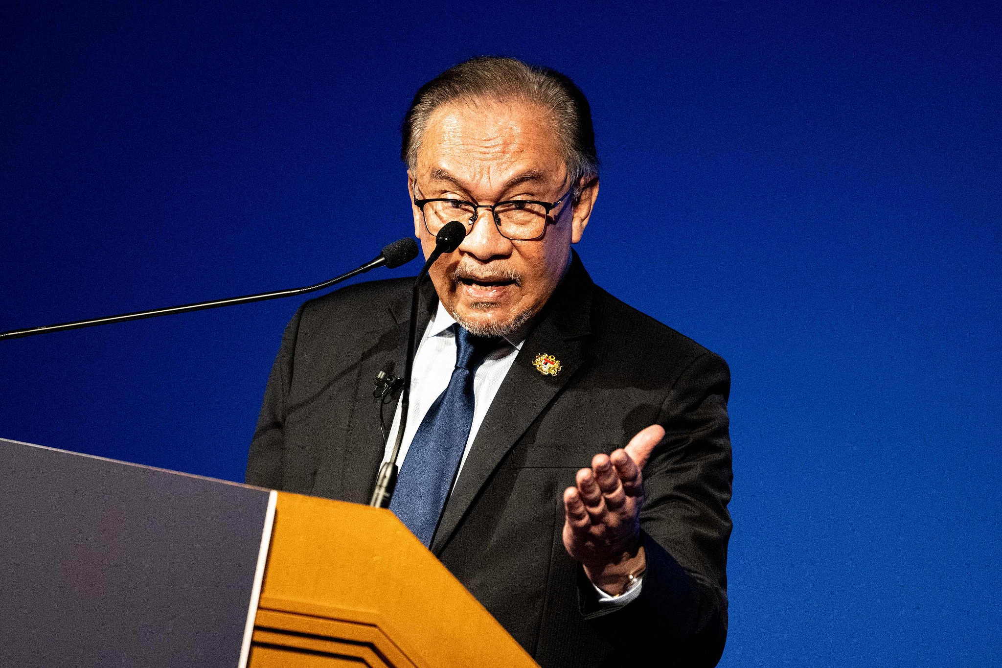 Malaysia's Prime Minister Anwar Ibrahim speaks at the Nikkei Forum in Tokyo, Japan, May 23, 2024. /CFP