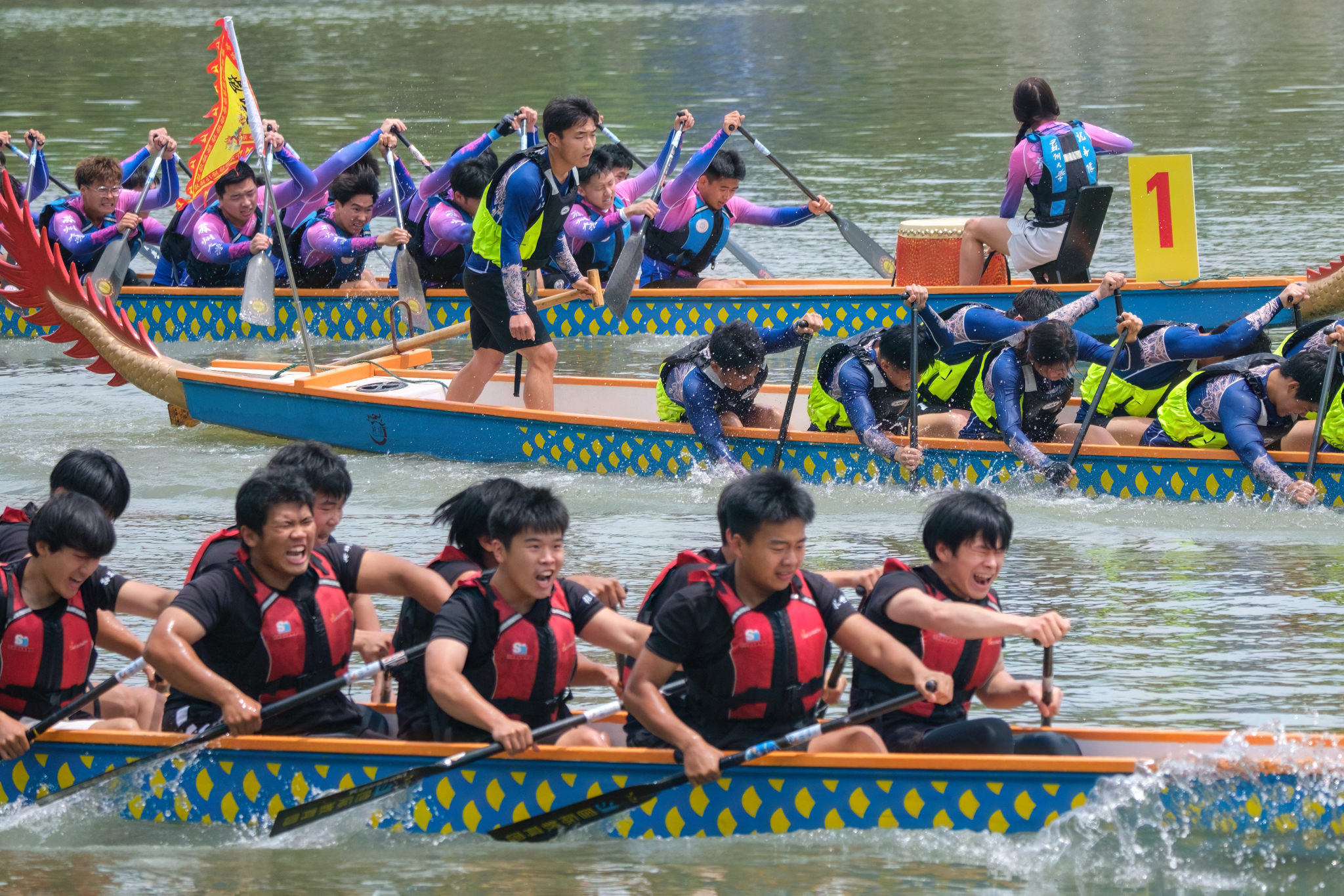 Participants paddle in their dragon boat during a race held on the Qinhuai River in Nanjing, Jiangsu Province on May 19, 2024. /CFP