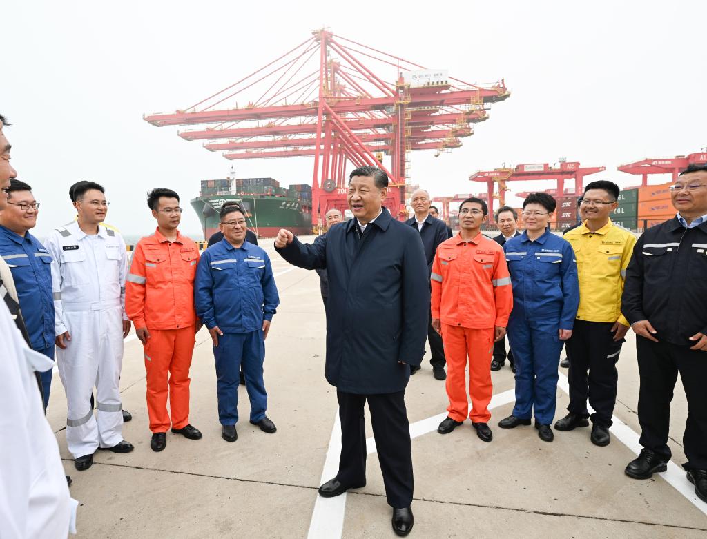 Chinese President Xi Jinping, also general secretary of the CPC Central Committee and chairman of the Central Military Commission, visits Rizhao Port in Rizhao, east China's Shandong Province, May 22, 2024. /Xinhua 