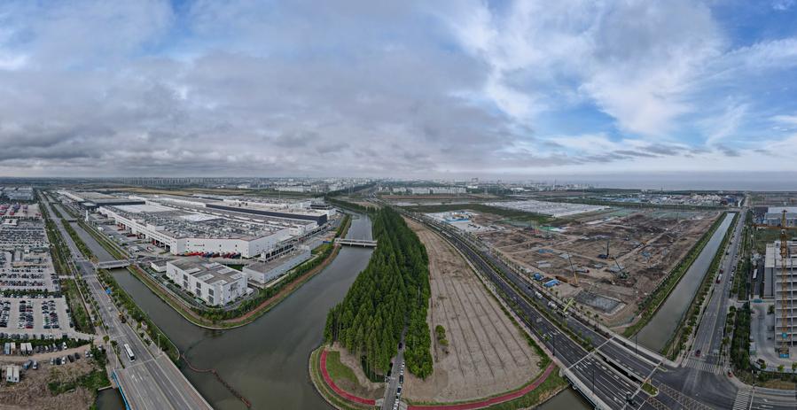 An aerial view shows the construction site (R) of U.S. carmaker Tesla's Megapack factory in Shanghai Municipality, east China, May 23, 2024. /Xinhua