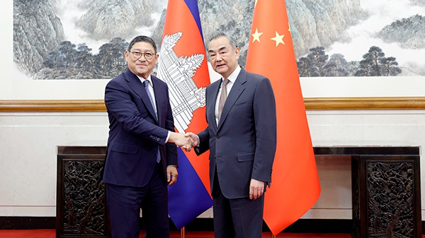 Chinese Foreign Minister Wang Yi (R) meets with Cambodian Deputy Prime Minister and Minister of Foreign Affairs and International Cooperation Sok Chenda Sophea in Beijing, China, May 24, 2024. /Chinese Foreign Ministry