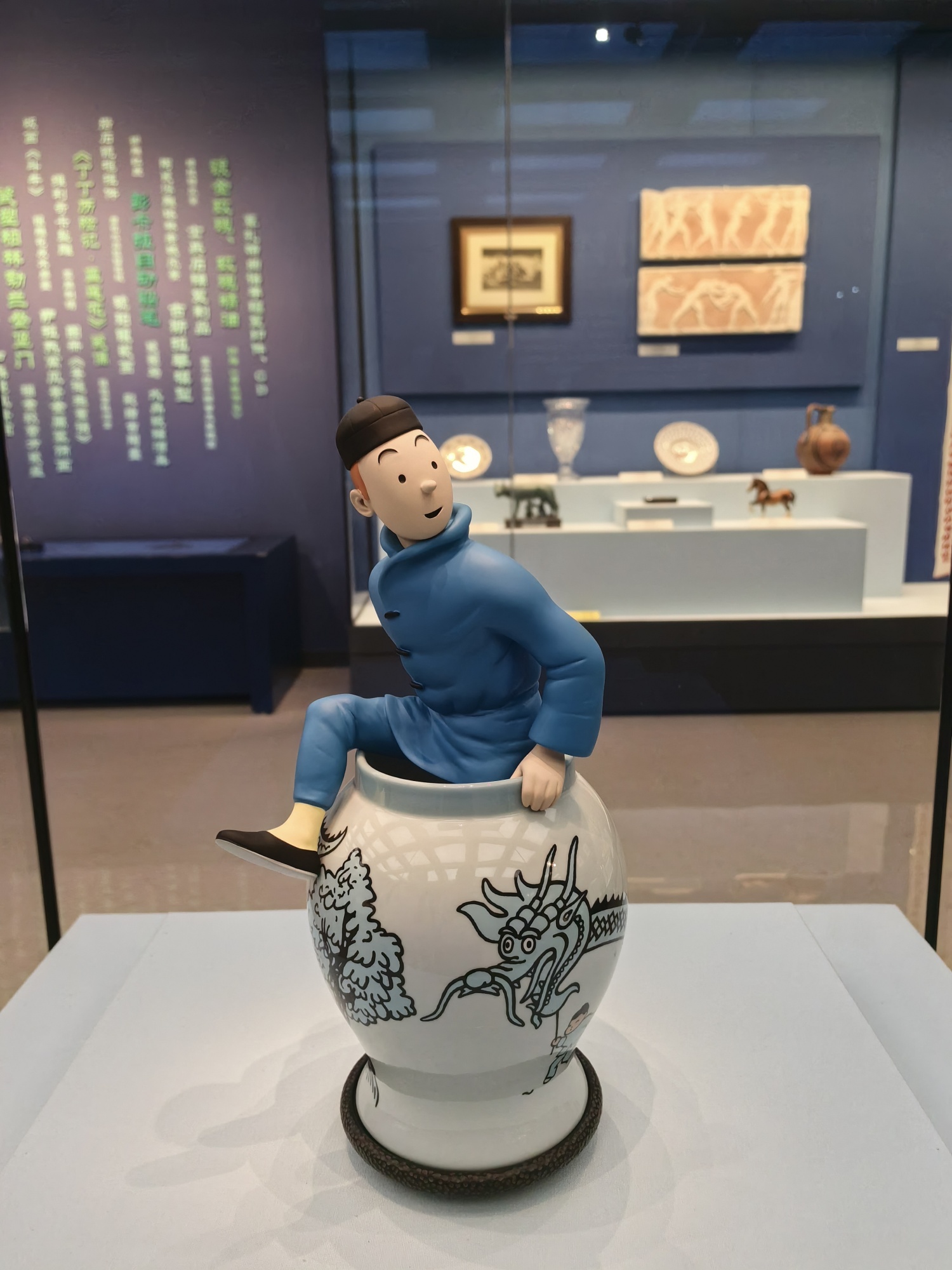The Adventures of Tintin: The Blue Lotus porcelain figurine sent by Belgium in 2012 is on display at the Central Gifts and Cultural Relics Management Center in Beijing, on May 23, 2024. /CGTN