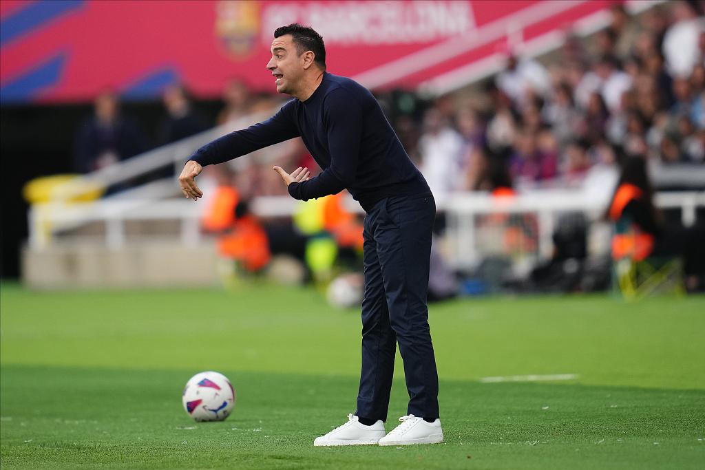 Xavi Hernandez, manager of Barcelona, makes a gesture during the La Liga game against Rayo Vallecano played at Lluis Companys Stadium in Barcelona, Spain, May 19, 2024. /CFP 