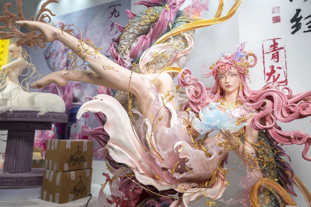 A fondant figurine is displayed at the National Exhibition and Convention Center in Shanghai, China on May 23, 2024. /IC