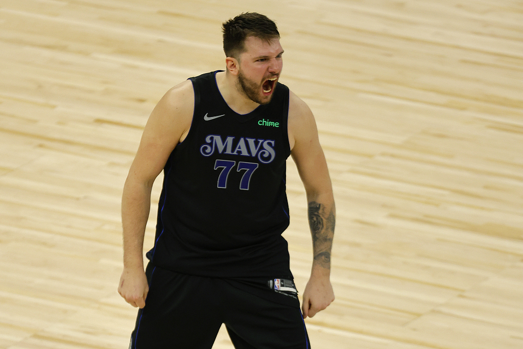Luka Doncic of the Dallas Mavericks reacts after making a 3-pointer in Game 2 of the NBA Western Conference Finals against the Minnesota Timberwolves at the Target Center in Minneapolis, Minnesota, May 24, 2024. /CFP