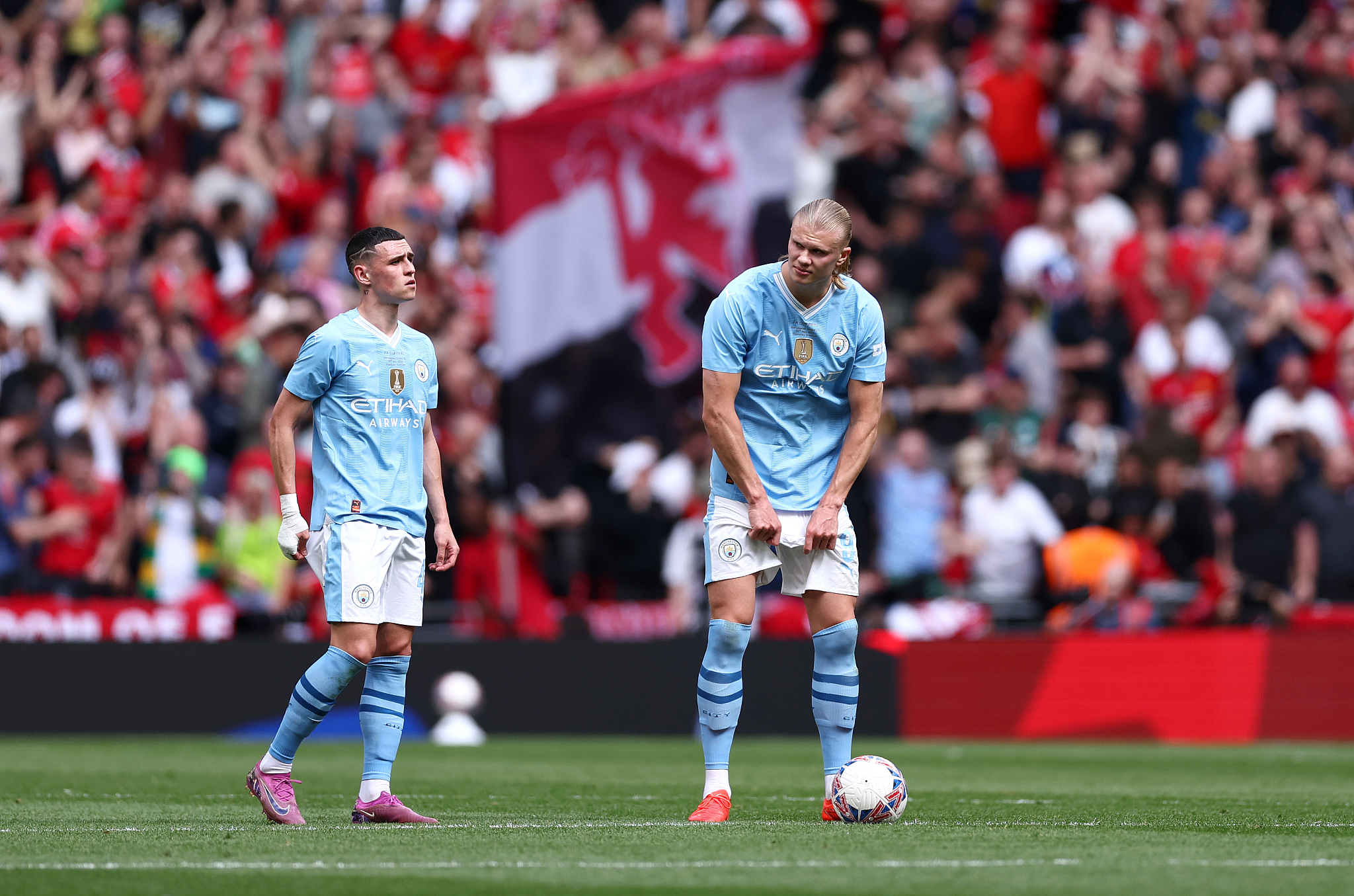 Erling Haaland and Phil Foden of Manchester City look dejected during the FA Cup final at Wembley stadium, in London, England, May 25, 2024. /CFP