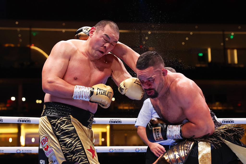 Zhilei Zhang and Joseph Parker exchange punches during the WBO Interim World Heavyweight title fight on the Knockout Chaos boxing card at the Kingdom Arena, Riyadh, Saudi Arabia, March 8, 2024. /CFP