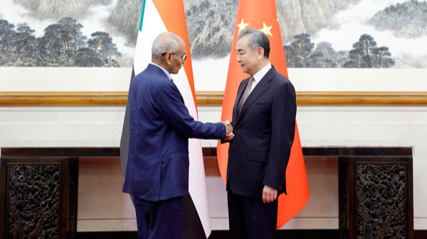 Chinese Foreign Minister Wang Yi (R), also a member of the Political Bureau of the Communist Party of China Central Committee, shakes hands with Sudanese Foreign Minister Hussein Awad in Beijing, China, May 28, 2024. /Chinese Foreign Ministry