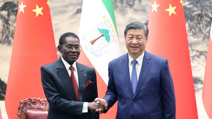 Chinese President Xi Jinping (R) shakes hands with Teodoro Obiang Nguema Mbasogo, president of Equatorial Guinea, in Beijing, China, May 28, 2024. /Xinhua
