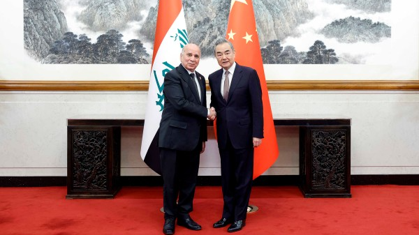 Chinese Foreign Minister Wang Yi (R), also a member of the Political Bureau of the Communist Party of China (CPC) Central Committee, meets with Iraqi Deputy Prime Minister and Foreign Minister Fuad Hussein in Beijing, China, May 29, 2024. /Chinese Foreign Ministry