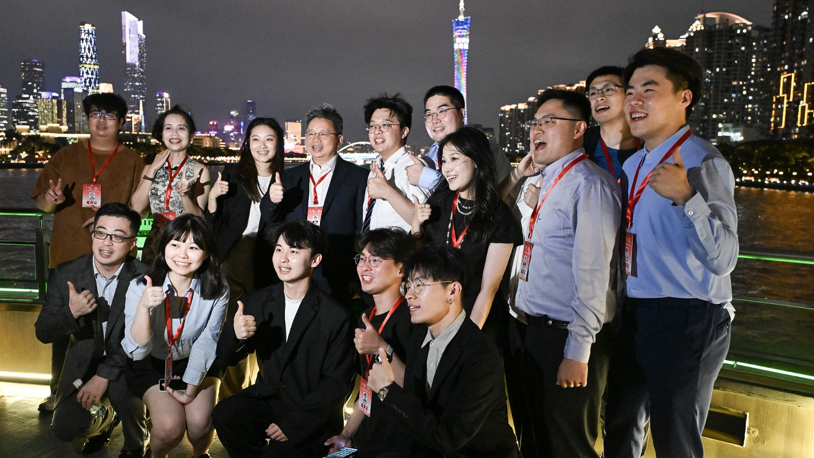 Representatives and guests attending a cross-Straits exchange event pose for a group photo in Guangzhou, south China's Guangdong Province, May 28, 2024. /CFP