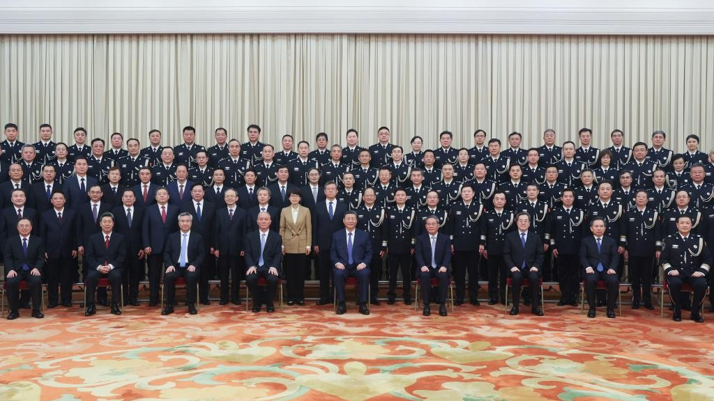 Party and state leaders Xi Jinping, Li Qiang, Cai Qi, Ding Xuexiang and Li Xi meet with police personnel attending a national conference on public security work at the Great Hall of the People in Beijing, China, May 28, 2024. /Xinhua