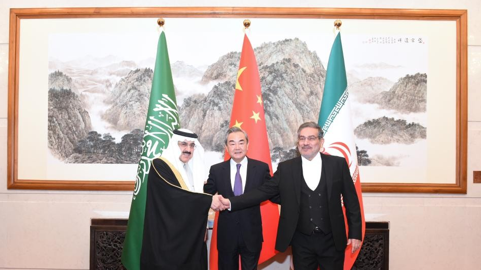 Wang Yi (C), a member of the Political Bureau of the Communist Party of China (CPC) Central Committee and director of the Office of the Foreign Affairs Commission of the CPC Central Committee, attends a closing meeting of the talks between the Saudi delegation led by Musaad bin Mohammed Al-Aiban (L), Saudi Arabia's Minister of State, Member of the Council of Ministers and National Security Advisor, and the Iranian delegation led by Admiral Ali Shamkhani (R), Secretary of the Supreme National Security Council of Iran, in Beijing, capital of China, March 10, 2023. /Xinhua