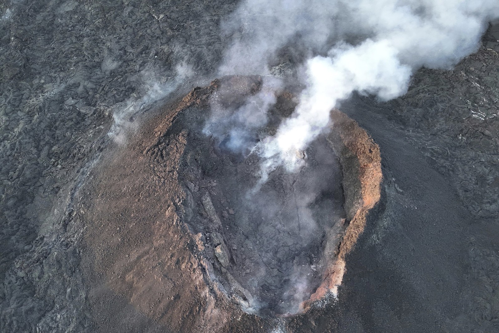Iceland volcano spews lava toward evacuated town