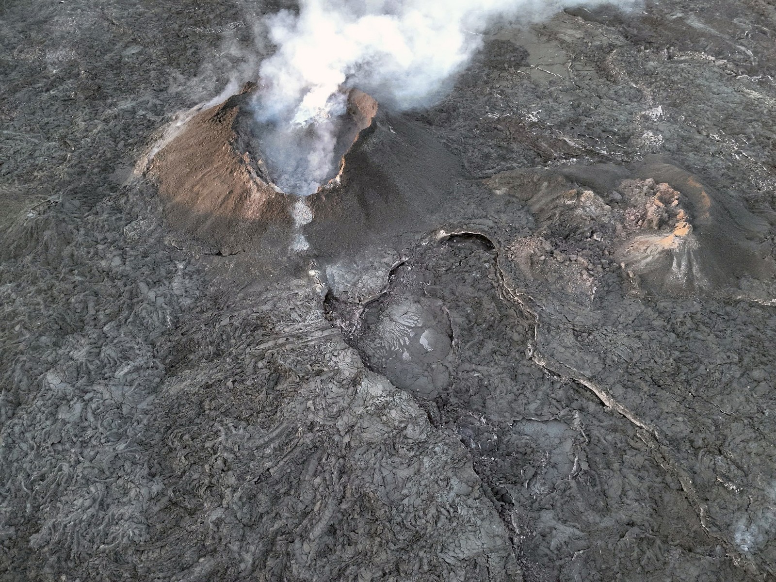 Iceland volcano spews lava toward evacuated town