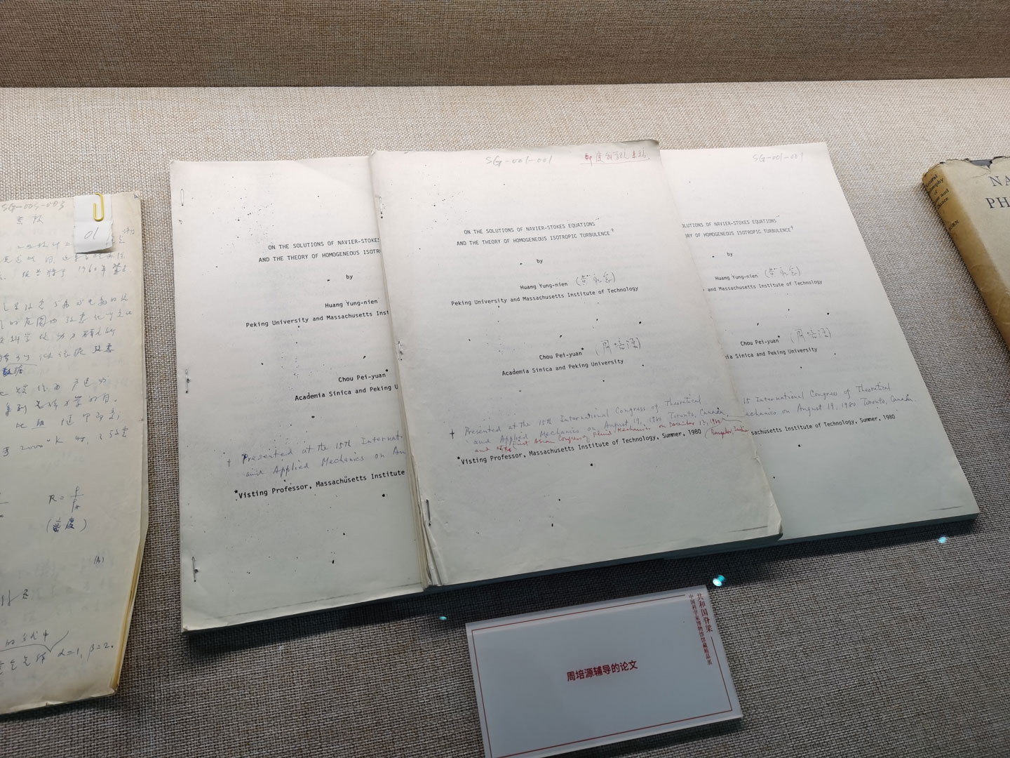 Copies of thesis papers penned by Zhou's students in 1980 are displayed in the National Museum for Modern Chinese Scientists, Beijing, May 30, 2024. /CGTN
