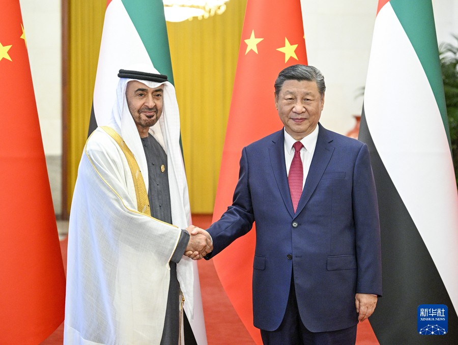 Chinese President Xi Jinping (R) shakes hands with President of the UAE Sheikh Mohamed bin Zayed Al Nahyan in Beijing, China, May 30, 2024. /Xinhua