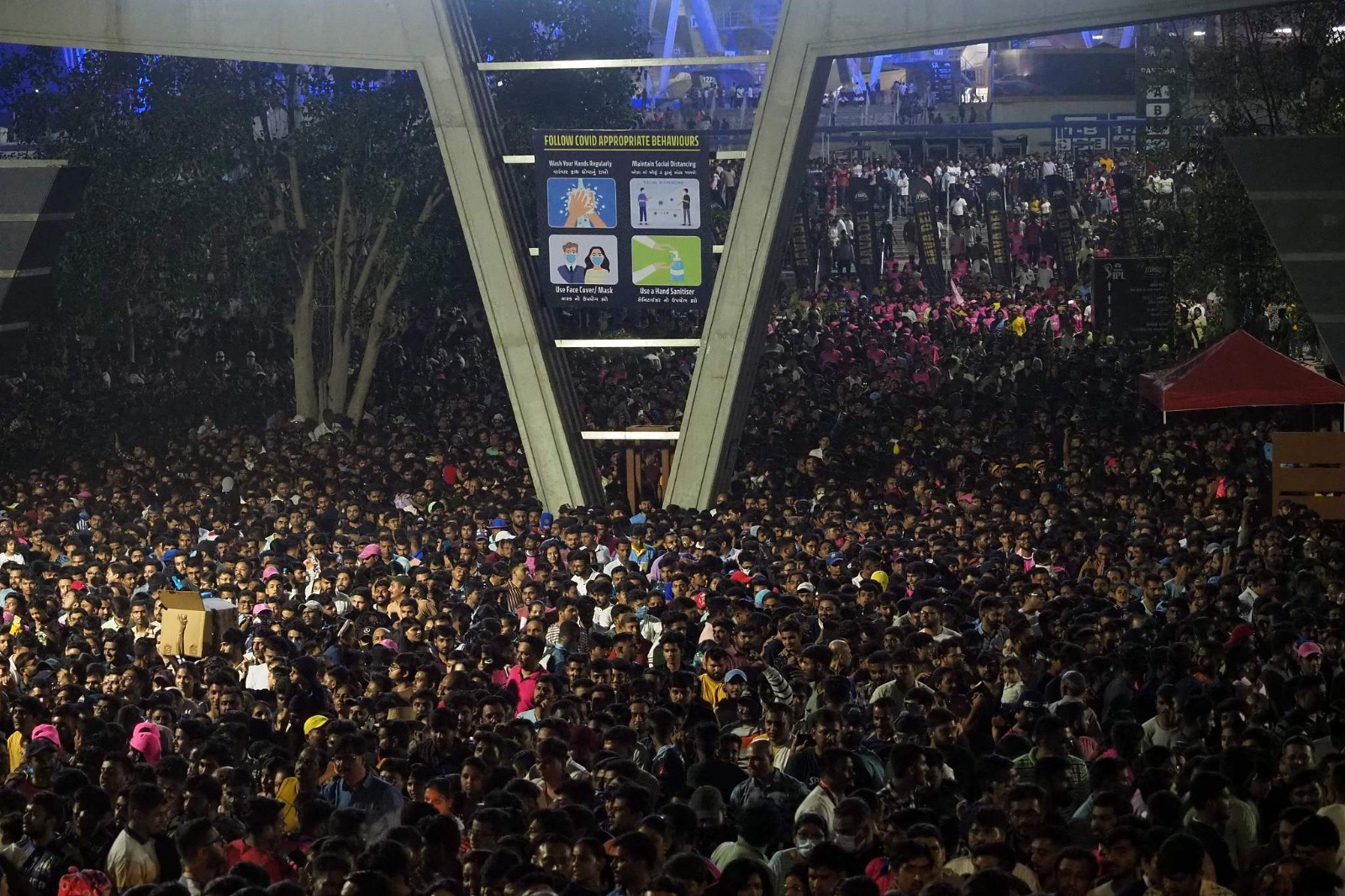 In this file photo taken on April 16, 2023, spectators leave the Narendra Modi Stadium after watching the Indian Premier League T20 cricket match between Gujarat Titans and Rajasthan Royals in Ahmedabad, India. IPL games draw thousands to stadia and millions to TV sets in India. /CFP