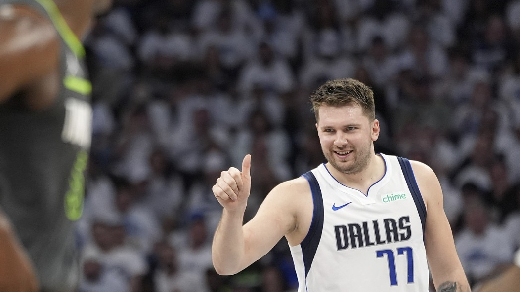Dallas Mavericks guard Luka Doncic #77 celebrates his score during the first half in Game 5 of the NBA Western Conference Finals in Minneapolis, Minnesota, U.S., May 30, 2024. /CFP