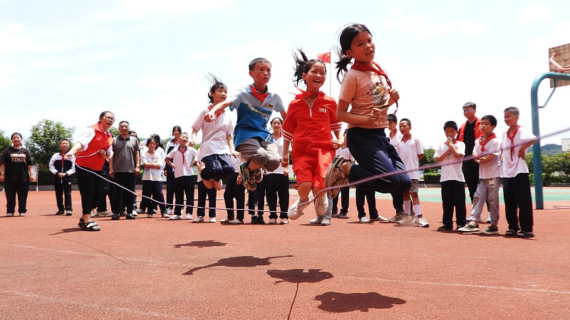 Children take part in rope-skipping at a primary school in Dazhou City, Sichuan Province, China, May 31, 2024. /CFP