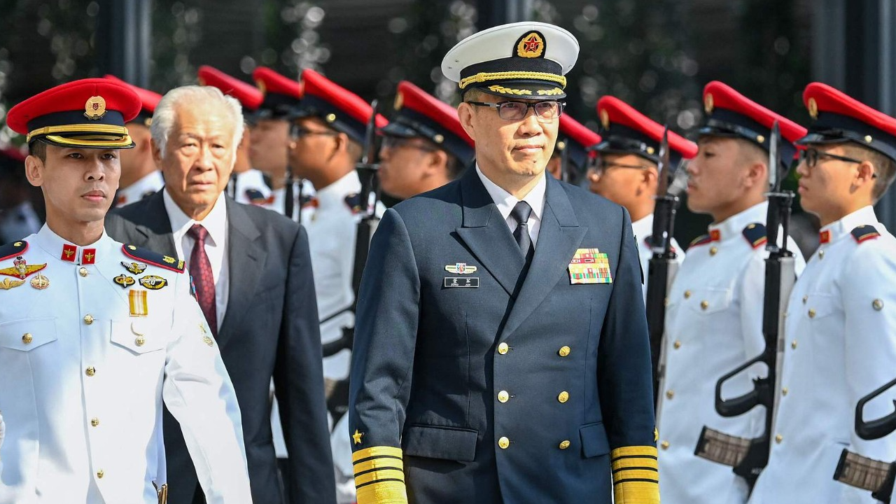Chinese Defense Minister Dong Jun attends a welcome ceremony hosted by his Singaporean counterpart in Singapore, May 30, 2024. /CFP