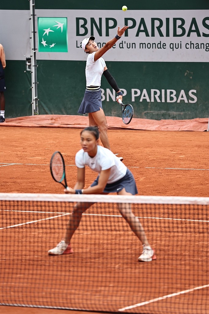 China's Wang Xiyu (back) and Yuan Yue (front) in action during their women's doubles match at the French Open in Paris, France, May 31, 2024. /CFP
