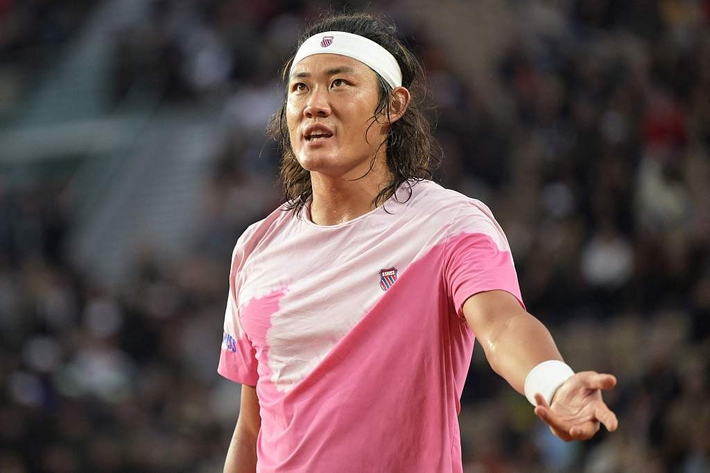 China's Zhang Zhizhen reacts as he plays against Greece's Stefanos Tsitsipas (not pictured) on Court Suzanne-Lenglen during their men's singles match of the French Open in Paris, France, May 31, 2024. /CFP