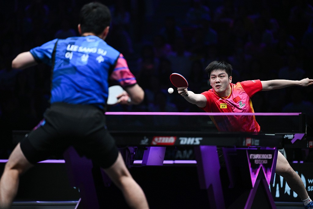 Fan Zhendong (R) of China and Lee Sang-su of South Korea in action during their men's singles match at WTT Champions event in Chongqing, China, May 31, 2024. /CFP