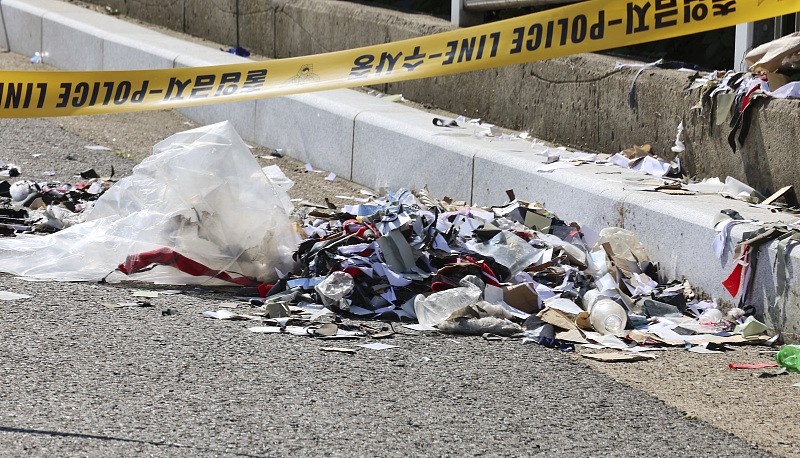 The trash from a balloon presumably sent by the DPRK, is seen behind police tape in Incheon, South Korea, June 2, 2024. /CFP